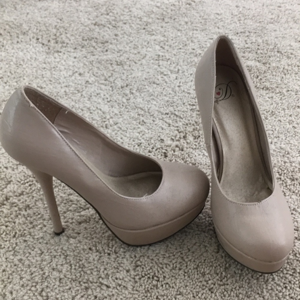 Nude closed toed heels